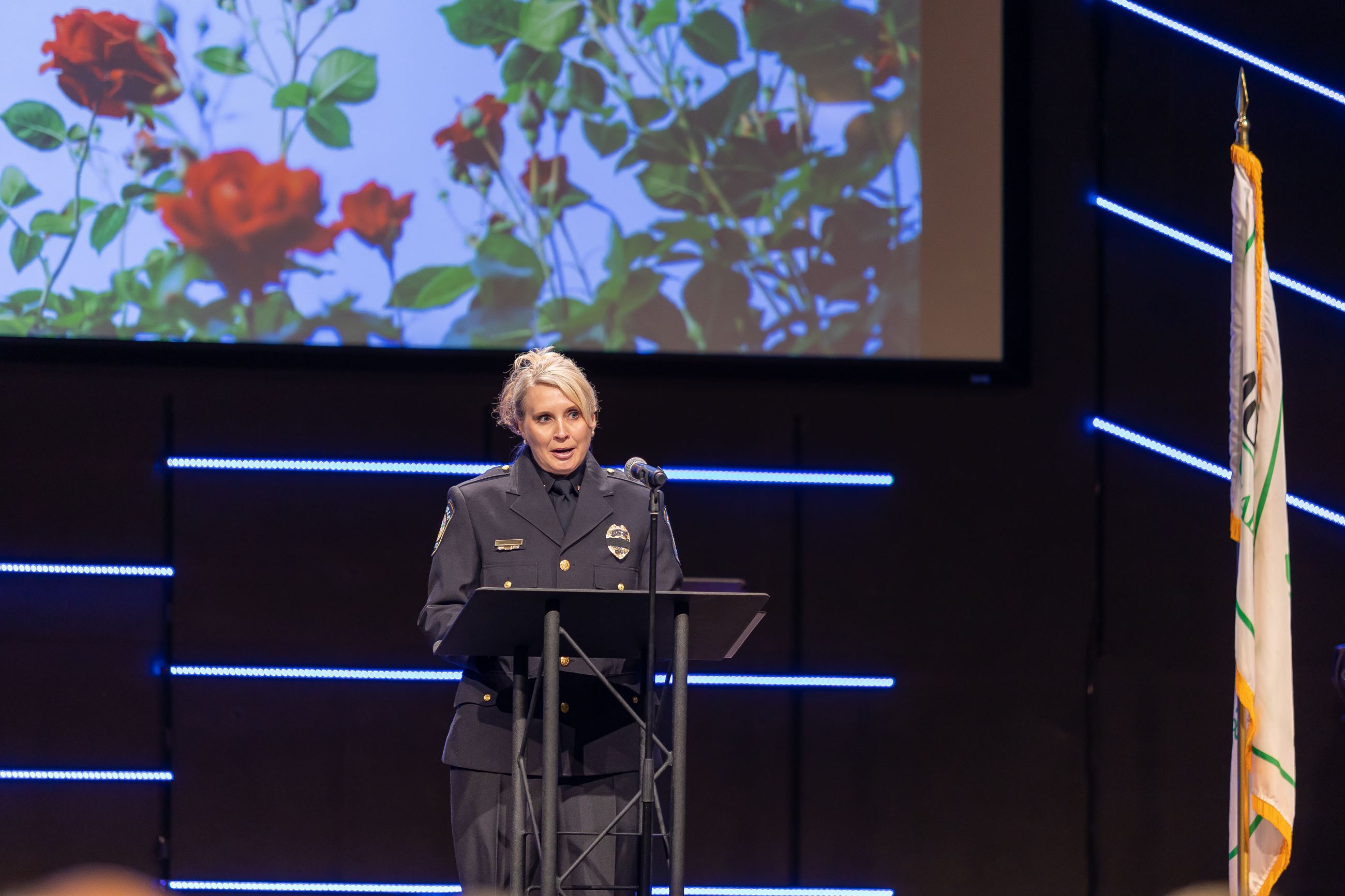 Chief Scheider speaking at podium