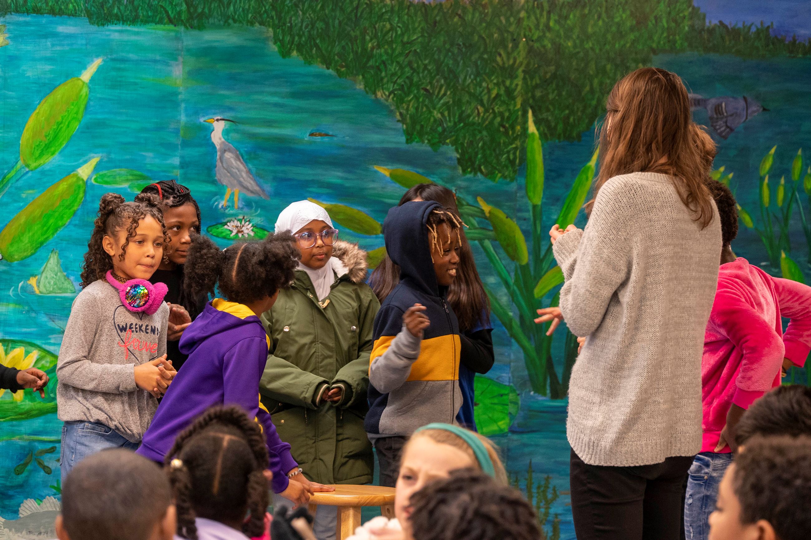 Students learn about Native American dances and wild rice. 