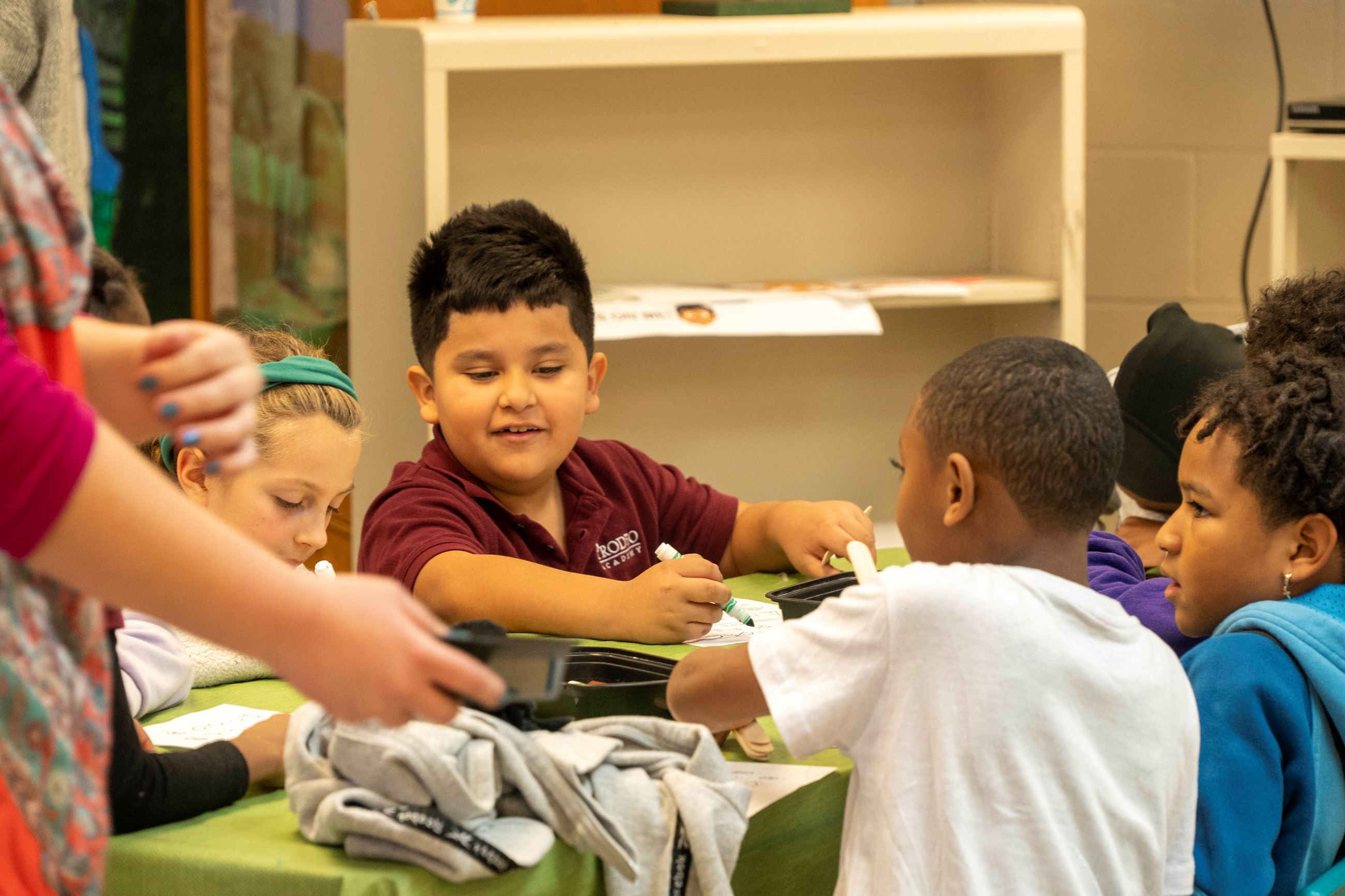 Students do Native American-inspired craft projects.