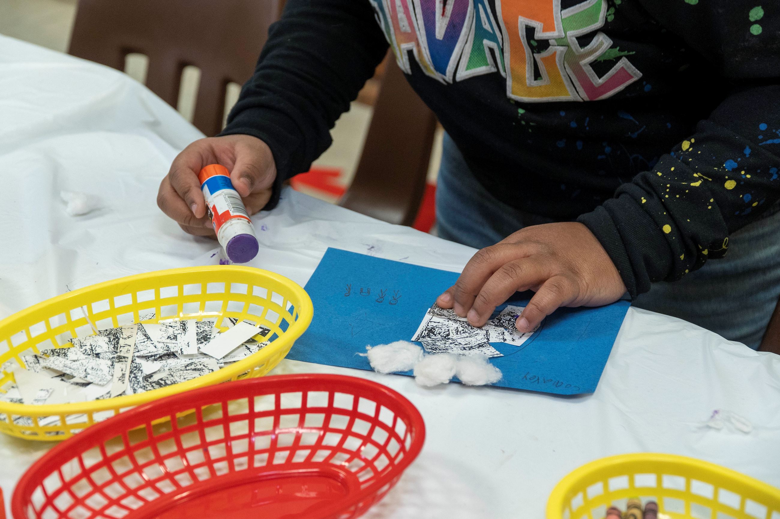 A student does Native American-inspired crafts.