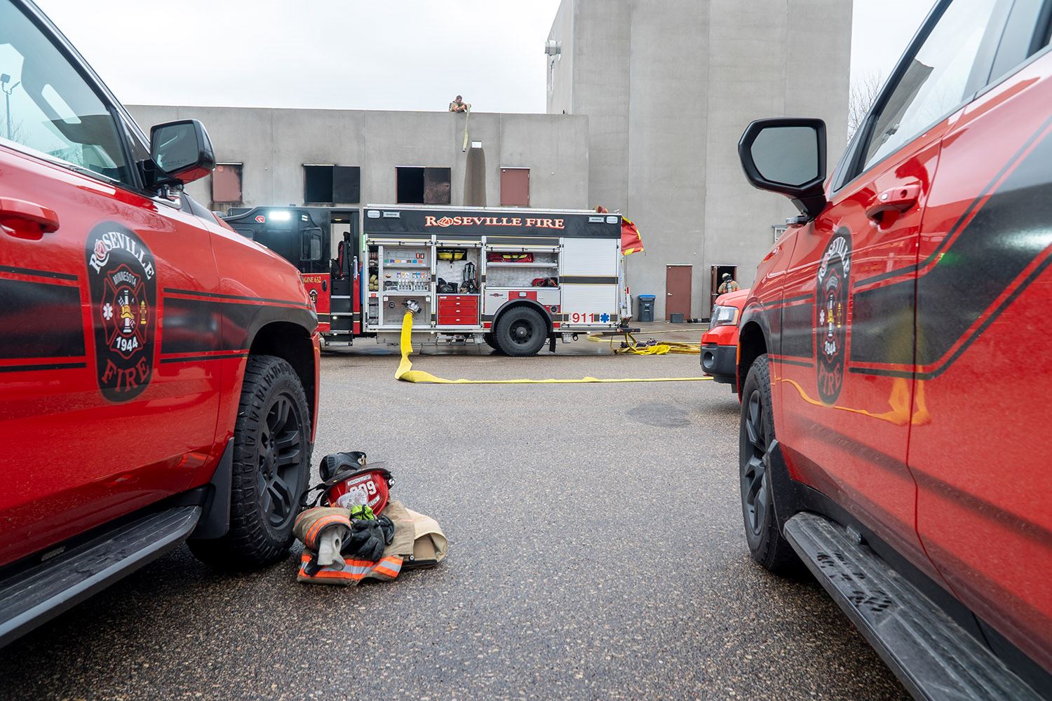 Fire vehicles during a live burn training.