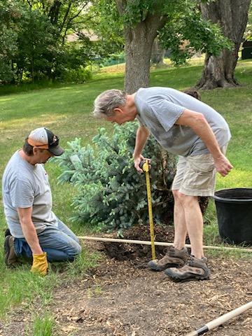 Residents plant trees at Keller Mayflower Park.