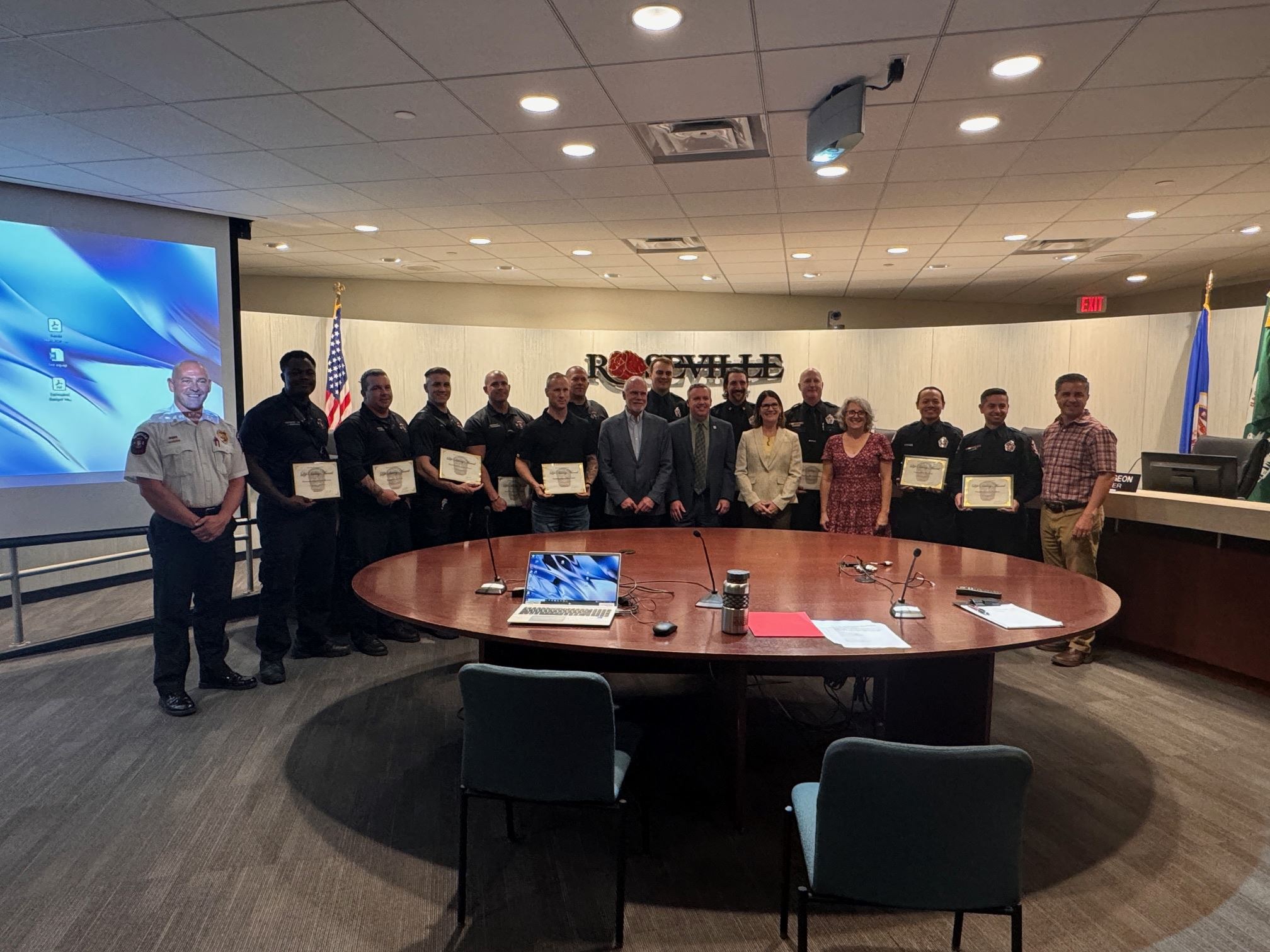 The Roseville City Council with award-winning Roseville and Maplewood Firefighters.
